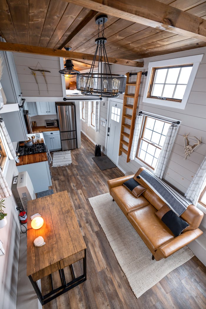A cozy, modern rustic living room with wooden elements and natural light.